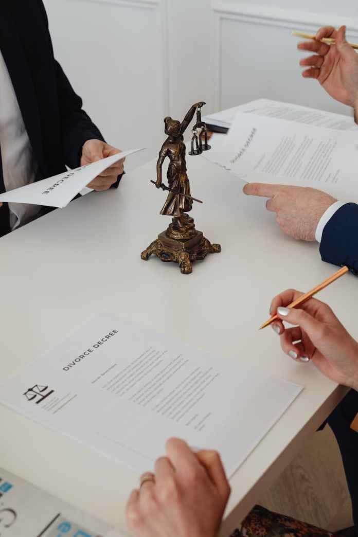 lady justice figurine over a law office table