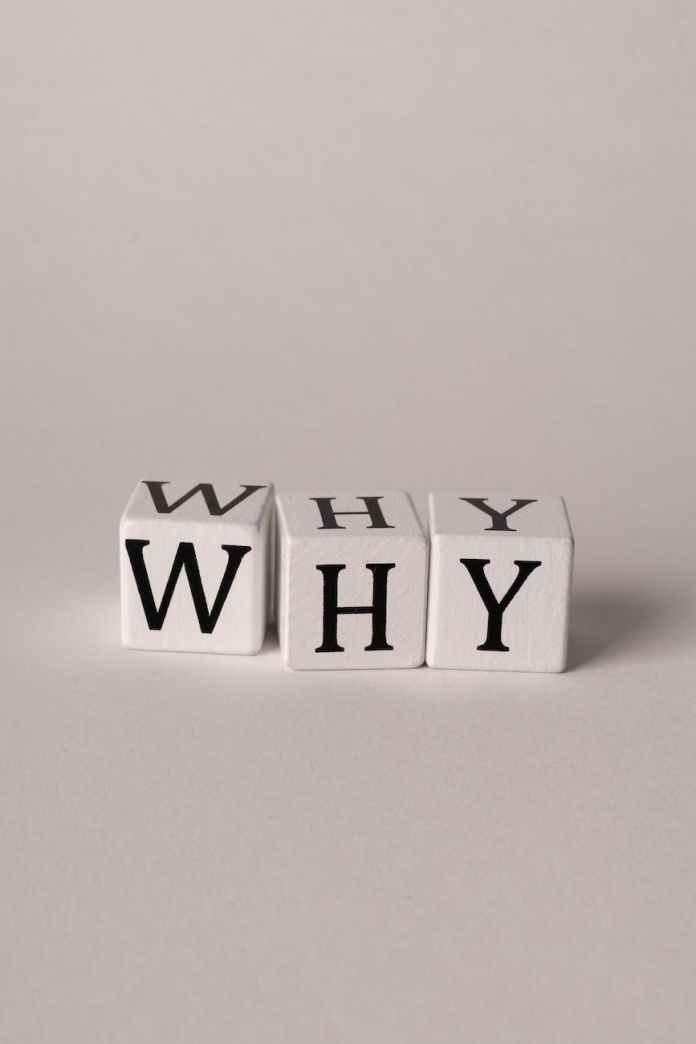 the word why made with cubes with letters