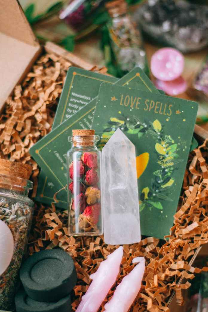 the love spells box contains candles crystals and other items