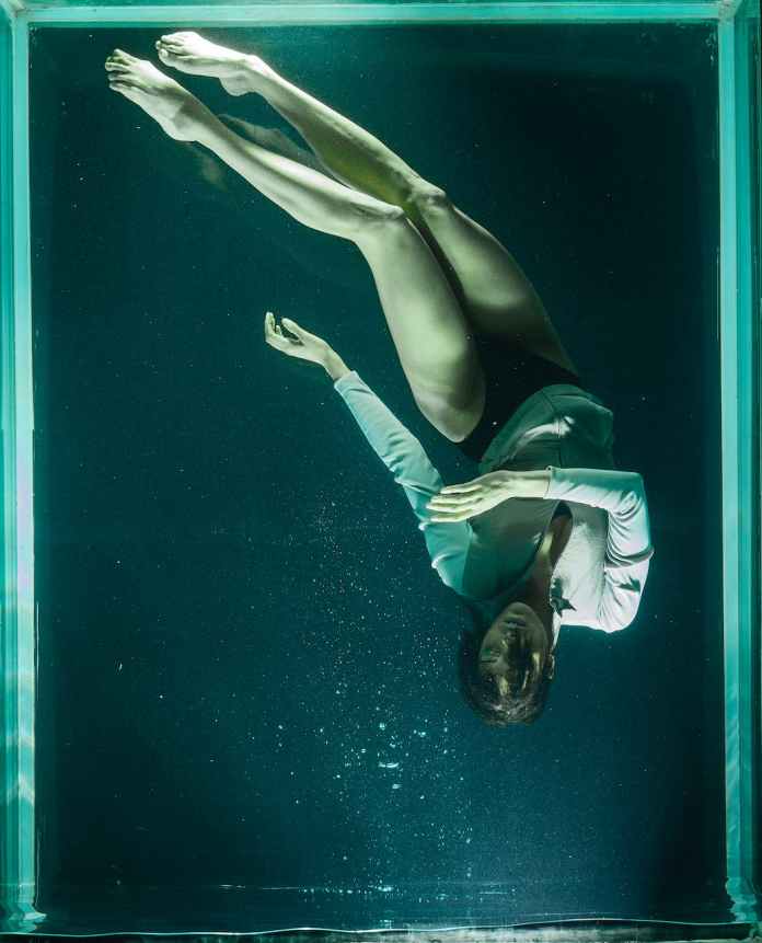 photo of woman underwater