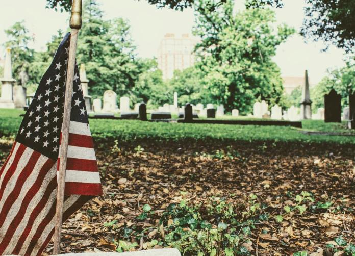 u s flag stand on national heroes cemetery