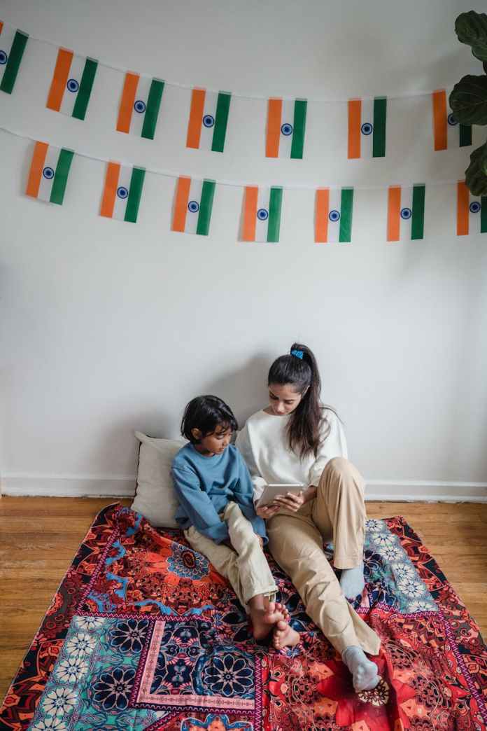 man and woman sitting on couch